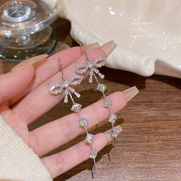 Wholesale Women's Copper Zircon Bow Long Tassel Earrings