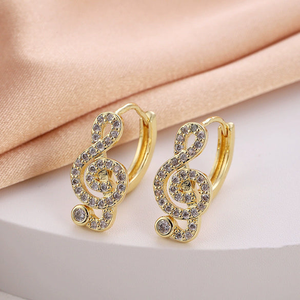 Wholesale Women's Copper Zircon Earrings With Animal Zodiac Flower Bow Geometric Patterns Electroplated Real Gold
