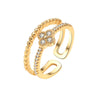 Wholesale Women's Copper Zircon Fourleaf Clover Geometric Ring With Electroplating
