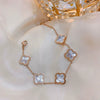 Wholesale Women's Copper Zircon Inlaid Fourpetal Flower Geometric Sweet Style Bracelet Real Gold Electroplated