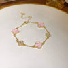 Wholesale Women's Copper Zircon Inlaid Fourpetal Flower Geometric Sweet Style Bracelet Real Gold Electroplated