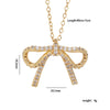 Wholesale Women's Copper Zircon O Chain Necklace With Mixed Gemstone Inlay Bow Tie Pendant Electroplated Vintage Light Luxury Style