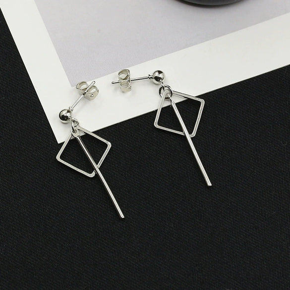 Wholesale Women's Cos Style Asymmetric Geometric Triangle And Circle Earrings In Alloy With Electroplating