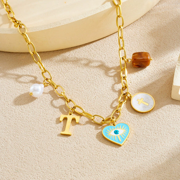 Wholesale Women's Creamy Sweet Style Heart Shape Cartoon Multielement Oil Dripping Love Eyes Letter Round Pendant Stainless Steel Electroplated Necklace With Flat Cross Chain