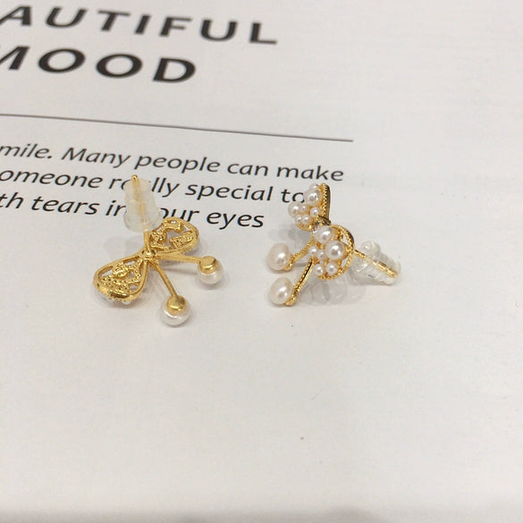 Wholesale Women's Cute Bow Natural Freshwater Pearl Earrings In 18K Gold Color Oblate Shape
