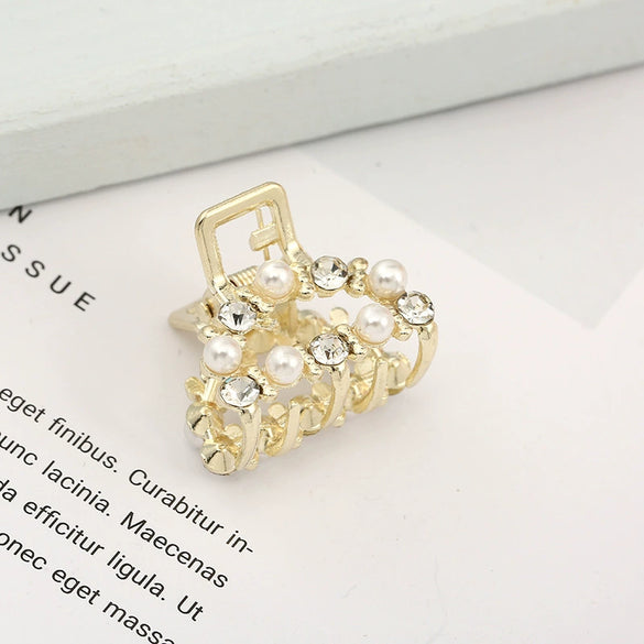 Wholesale Women's Cute Pearl Rhinestone Side Hair Clip Hair Accessories With Electroplating Treatment