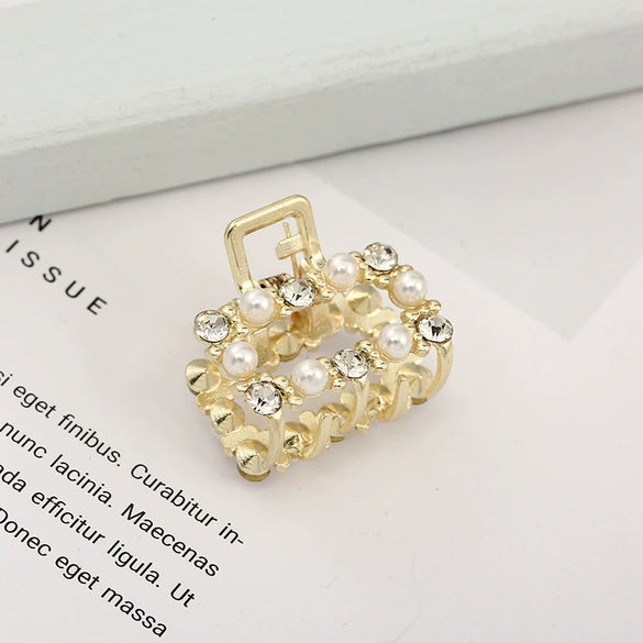 Wholesale Women's Cute Pearl Rhinestone Side Hair Clip Hair Accessories With Electroplating Treatment