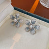 Wholesale Women's Diecast Silver Needle Blue Crystal Flower Pearl Earrings With Diamond Design And High Sense Style