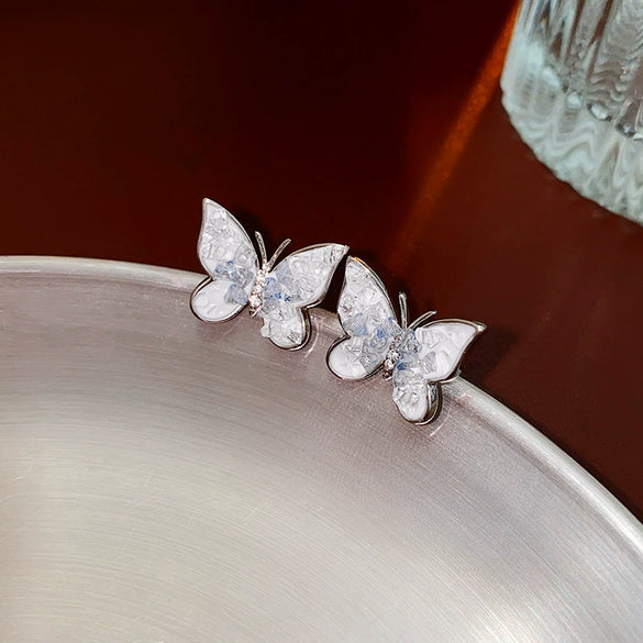 Wholesale Women's Diecast Silver Needle Blue Crystal Flower Pearl Earrings With Diamond Design And High Sense Style