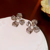 Wholesale Women's Diecast Silver Needle Blue Crystal Flower Pearl Earrings With Diamond Design And High Sense Style