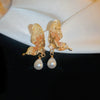 Wholesale Women's Diecast Silver Needle Blue Crystal Flower Pearl Earrings With Diamond Design And High Sense Style
