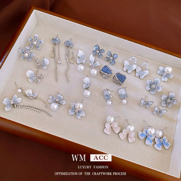 Wholesale Women's Diecast Silver Needle Blue Crystal Flower Pearl Earrings With Diamond Design And High Sense Style