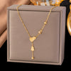 Wholesale Women's Doublelayered Long Necklace With Heart Shape Titanium Steel Pendant Real Gold Plated In The Furnace Oshaped Chain