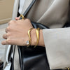 Wholesale Women's Drop Shaped Zircon Wave Open Bracelet Fashion Minimalist Electroplated Stainless Steel Jewelry