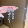 Wholesale Women's Elegant Copper Flower Long Earrings With Tassel Leaf