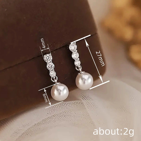 Wholesale Women's Elegant Geometric Round Imitation Pearl And Zircon Earrings Copper Jewelry