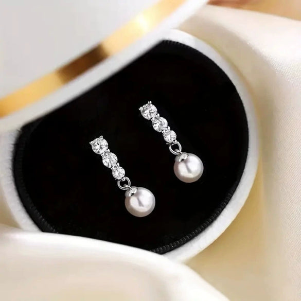 Wholesale Women's Elegant Geometric Round Imitation Pearl And Zircon Earrings Copper Jewelry