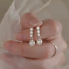 Wholesale Women's Elegant Geometric Round Imitation Pearl And Zircon Earrings Copper Jewelry