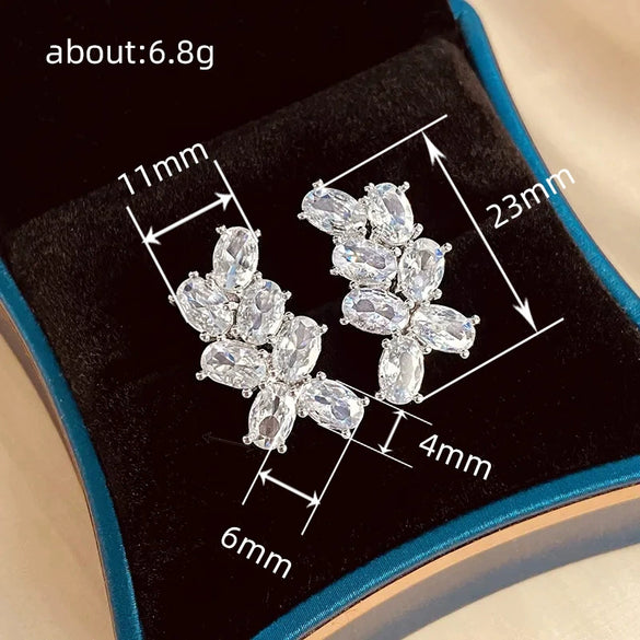 Wholesale Women's Elegant Ol Temperament Copper Earrings With Flower And Leaf Patterns And Microinlaid Zircons In Oval Shape