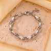 Wholesale Women's Elegant Simple Versatile Titanium Steel Bracelet With Heart Shape Flower Bow Tie Pattern Electroplated