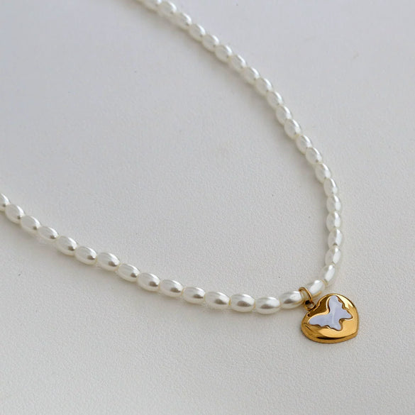 Wholesale Women's Fairy Style Titanium Steel Goldplated Pearl Casting Heart Pendant Necklace With String Of Pearls Chain