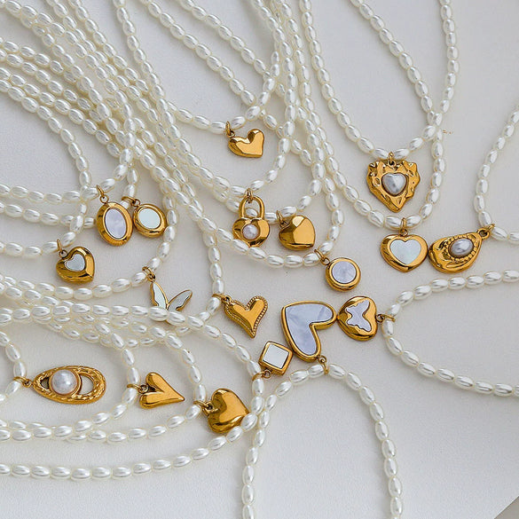 Wholesale Women's Fairy Style Titanium Steel Goldplated Pearl Casting Heart Pendant Necklace With String Of Pearls Chain