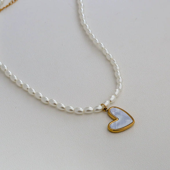 Wholesale Women's Fairy Style Titanium Steel Goldplated Pearl Casting Heart Pendant Necklace With String Of Pearls Chain