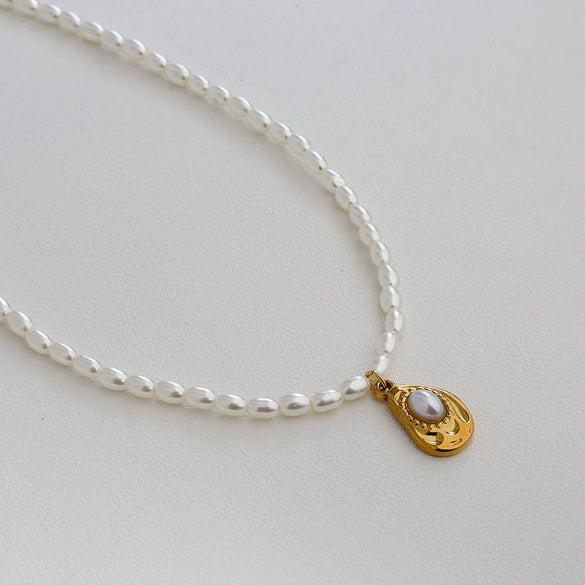 Wholesale Women's Fairy Style Titanium Steel Goldplated Pearl Casting Heart Pendant Necklace With String Of Pearls Chain