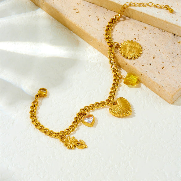 Wholesale Women's Fashion Creative Multielement Stainless Steel Goldplated Flower And Heart Shape Pendant Side Chain Bracelet
