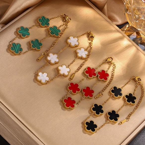 Wholesale Women's Fashion Fresh Stainless Steel Bracelet With Five Leaf Grass And Plum Blossom Pattern Electroplated