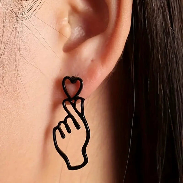 Wholesale Women's Fashion Geometric Copper Hollowout Heart Earrings With Electroplating