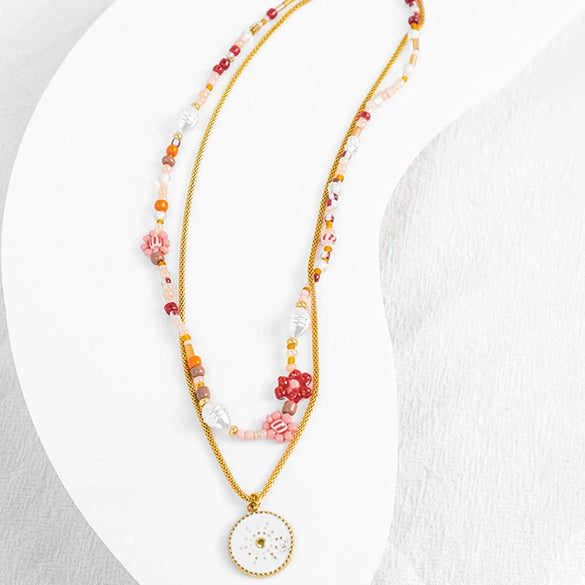 Wholesale Women's Fashion Geometric Stainless Steel And Pearl Beaded Sunflower Pendant Necklace With Electroplating Treatment