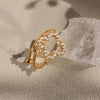 Wholesale Women's Fashion Geometric Stainless Steel Four Leaf Flower Ring With Electroplating Design