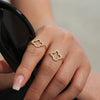 Wholesale Women's Fashion Geometric Stainless Steel Four Leaf Flower Ring With Electroplating Design