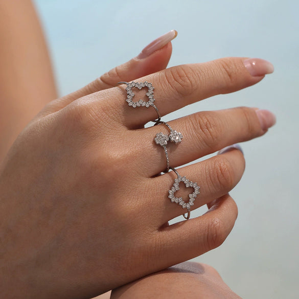 Wholesale Women's Fashion Geometric Stainless Steel Four Leaf Flower Ring With Electroplating Design