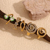 Wholesale Women's Fashion Geometric Stainless Steel 18K Gold Electroplated Swirl Knotted Daisy Ring