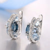 Wholesale Women's Fashion Jewelry Copper Zircon Xshaped Hollow Earrings With Flower Pattern