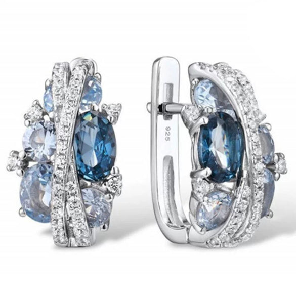 Wholesale Women's Fashion Jewelry Copper Zircon Xshaped Hollow Earrings With Flower Pattern