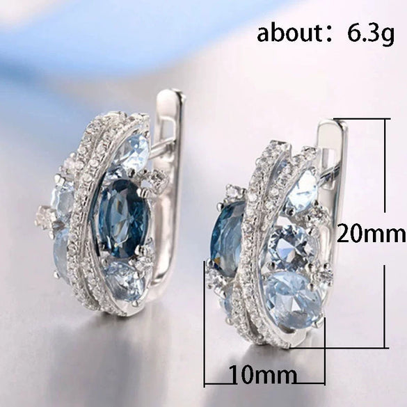 Wholesale Women's Fashion Jewelry Copper Zircon Xshaped Hollow Earrings With Flower Pattern