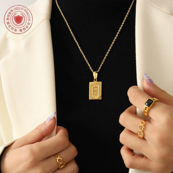 Wholesale Women's Fashion Jewelry Titanium Steel Ferris Wheel Design 18K Gold Plated Square Pendant Clavicle Chain With Letter And Number Patterns