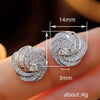 Wholesale Women's Fashion Light Luxury Copper Geometric Rotating Earrings With Wave Pattern And Electroplating Treatment