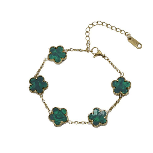 Wholesale Women's Fashion Luxury Vacuumplated 18K Titanium Steel Clover Flower Bracelet
