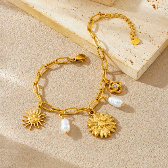 Wholesale Women's Fashion Pearl Flower Stainless Steel Goldplated Bracelet With Cross Chain And Sun Face Pendant