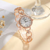 Wholesale Women's Fashion Quartz Watch With Aurora Fritillary Surface Hollow Alloy Case And Strap Round Dial
