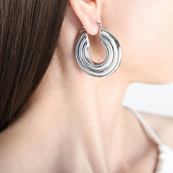 Wholesale Women's Fashion Simple Temperament Large Disc Hollow U Shaped Titanium Steel Gold Plated Earrings With Geometric Design