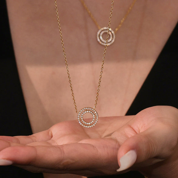 Wholesale Women's Fashion Stainless Steel Circle Pendant Clavicle Necklace And Bracelet Set With Electroplating Niche Design