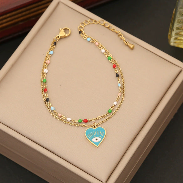Wholesale Women's Fashion Stainless Steel Heart Shaped Double O Chain Necklace With Electroplating And Drop Oil Eyes Design