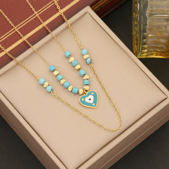 Wholesale Women's Fashion Stainless Steel Heart Shaped Double O Chain Necklace With Electroplating And Drop Oil Eyes Design