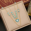 Wholesale Women's Fashion Stainless Steel Heart Shaped Double O Chain Necklace With Electroplating And Drop Oil Eyes Design