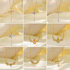 Wholesale Women's Fashion Titanium Steel And Copper Electroplated Heart Shape Micropaved Zirconia Angel Wings Pendant Necklace With O Word Chain Jewelry